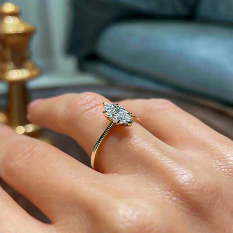 Ring with Moissanite Solitaire and Six-Prong Setting